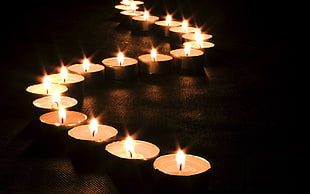 white candles with light