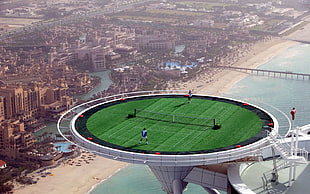 round gray and green open-door tennis ground, Dubai, tennis