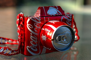 selective focus of Coca-Cola handmade tin can camera HD wallpaper