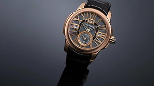 round gold-colored chronograph watch with black band, watch, luxury watches, DeMonaco