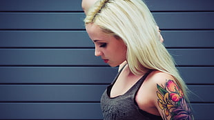 blonde haired woman in grey tank top touching her hair HD wallpaper