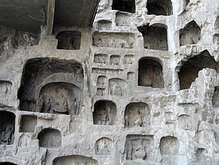 photography of concrete hindu diety embossed