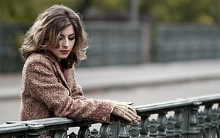 woman in brown coat during day time HD wallpaper