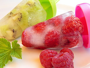 raspberry and sliced fruit popsicle