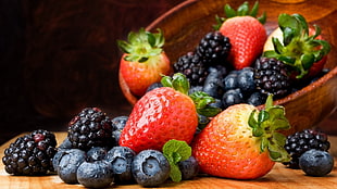 strawberries, blackberries, and mulberries on brown wooden table and bowl HD wallpaper