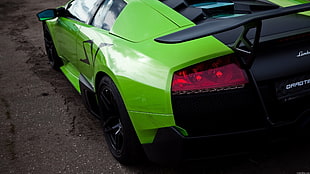 green and black Lambhorgini coupe, car