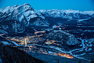 village and mountain cover with snow aerial photography