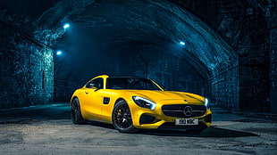 yellow Mercedes-Benz coupe