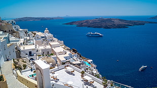 photography of body of water during daytime, santorini