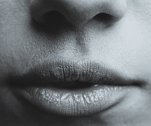 woman's lips grayscale photo