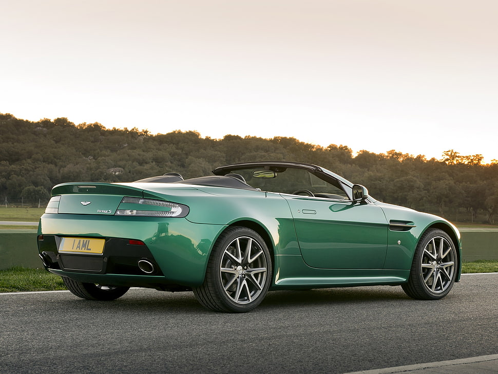 green convertible coupe on gray concrete road HD wallpaper