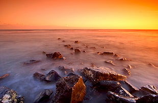 landscape photograph of rock formation during sunset