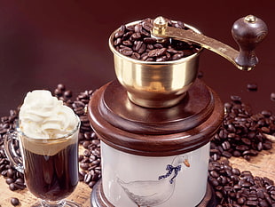 brown and stianless steel coffee grinder