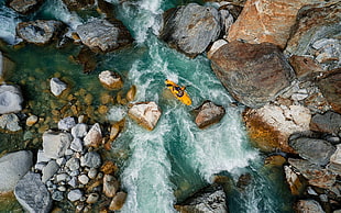 aerial photography of river with gray rocks