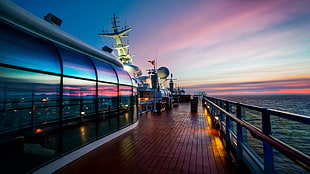 brown wooden floor with blue metal rail ship decor