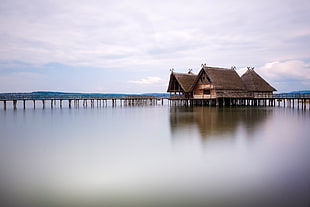body of water under house HD wallpaper