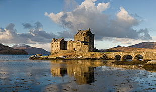 brown castle surrounded by body of water, Scotland, castle, UK, Eilean Donan