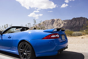 blue 5-door hatchback, Jaguar (car), sports car, desert, blue cars HD wallpaper