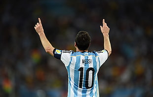 photo of Lionel Messi wearing teal and gray jersey HD wallpaper