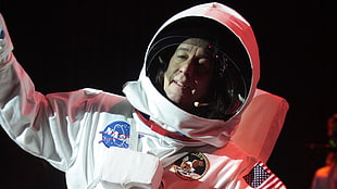 astronaut wearing NASA suit HD wallpaper