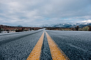 gray and yellow asphalt road