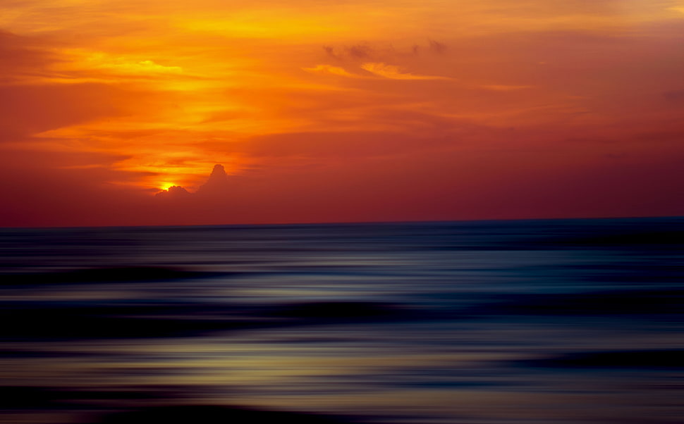 calm seas during golden hour HD wallpaper