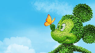 brown butterfly on green Mickey Mouse topiary HD wallpaper