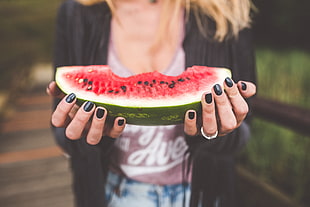 woman holding sliced watermelon HD wallpaper