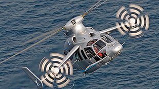photo of gray chopper above the sea during daytime HD wallpaper