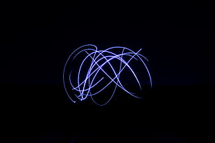 neon-white strobe light against black background
