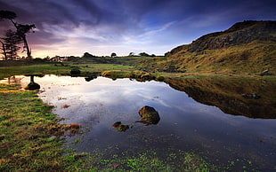 body of water with range mountain background HD wallpaper