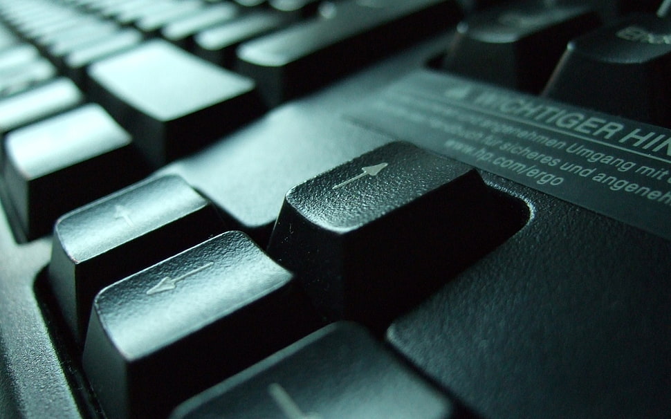 selective focus photography of computer keyboard arrow HD wallpaper