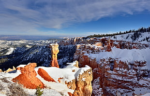 brown mountain covered with snow, utah, bryce canyon national park