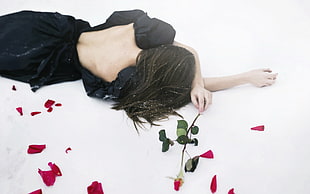 woman wearing black dress while holding flower HD wallpaper