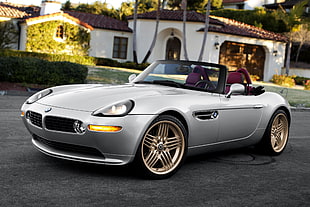 gray BMW convertible coupe on pavement