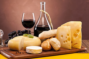 assorted cheese and clear wine glass photography