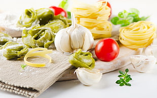 clove of garlic near on pasta