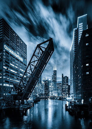 grayscale photo of folding bridge near building, chicago