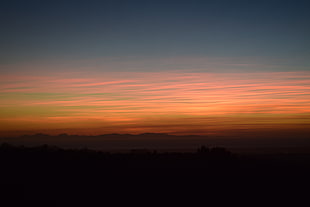 silhouette of land during golden hour photo