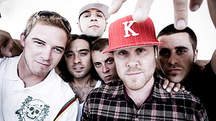 six men close to each other photo