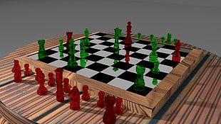 brown wooden chessboard with green and red pieces