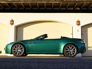 landscape photography of green convertible coupe