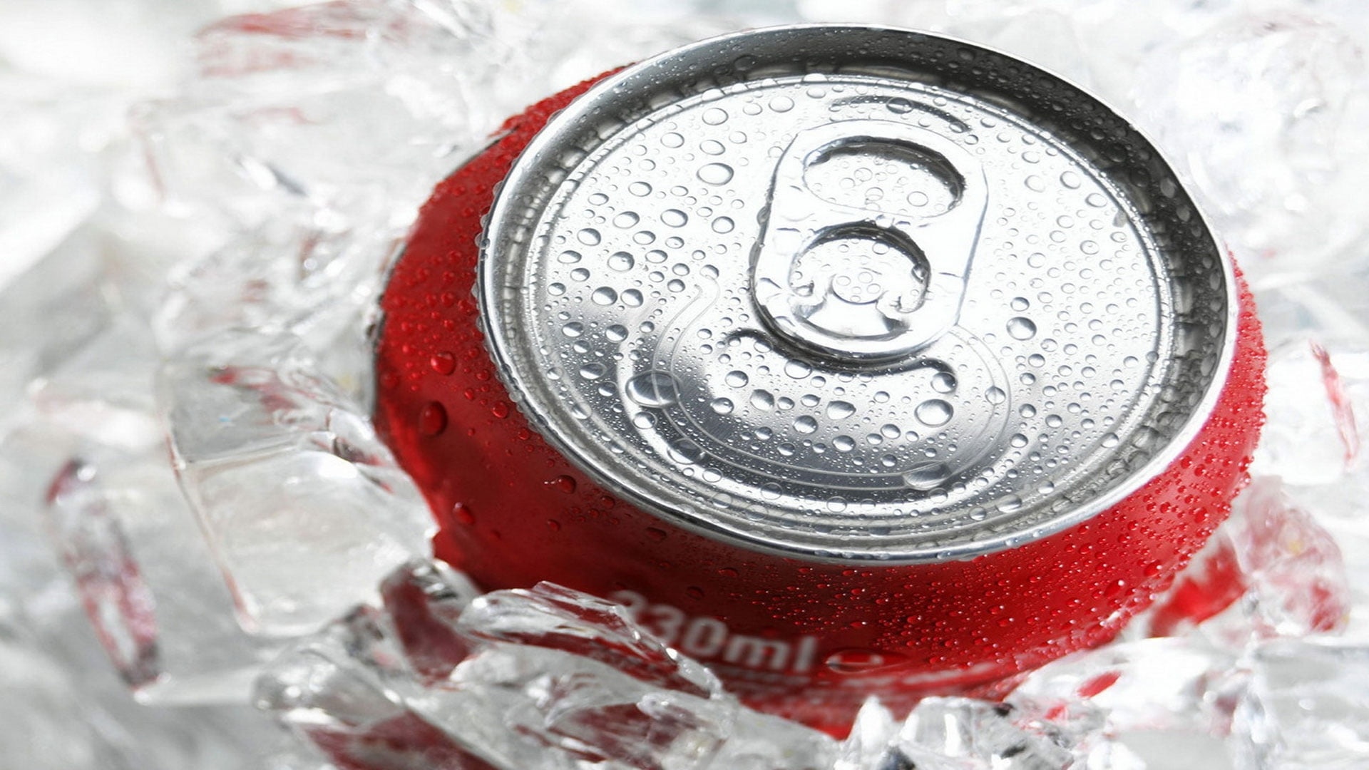 330mL Coca-cola can covered with ice cubes
