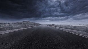 gray scale photography of road near field