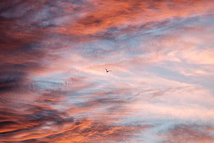 orange, blue, and black clouds