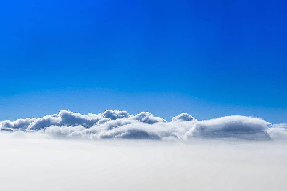 white clouds and blue skies wallpaper HD wallpaper