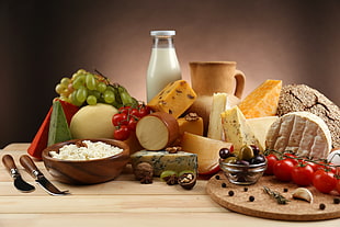 assorted-type cheese blocks and red cherry tomatoes, food