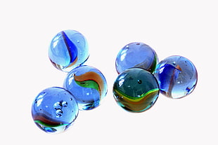six blue marbles