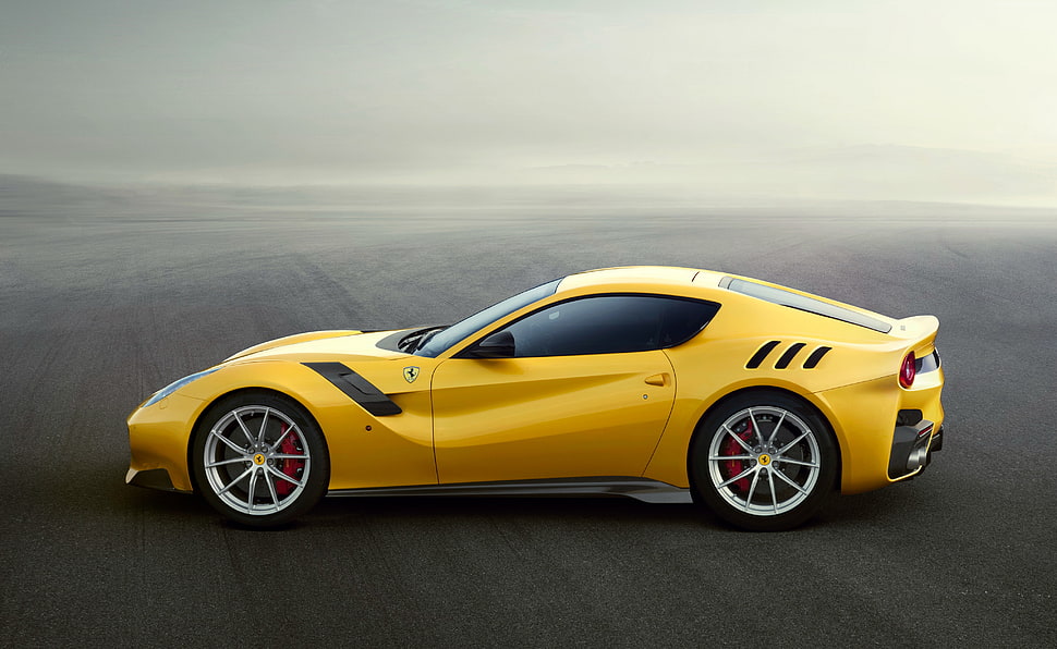 yellow Ferrari sports car HD wallpaper