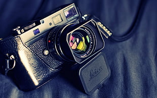 black and gray Leica SLR camera